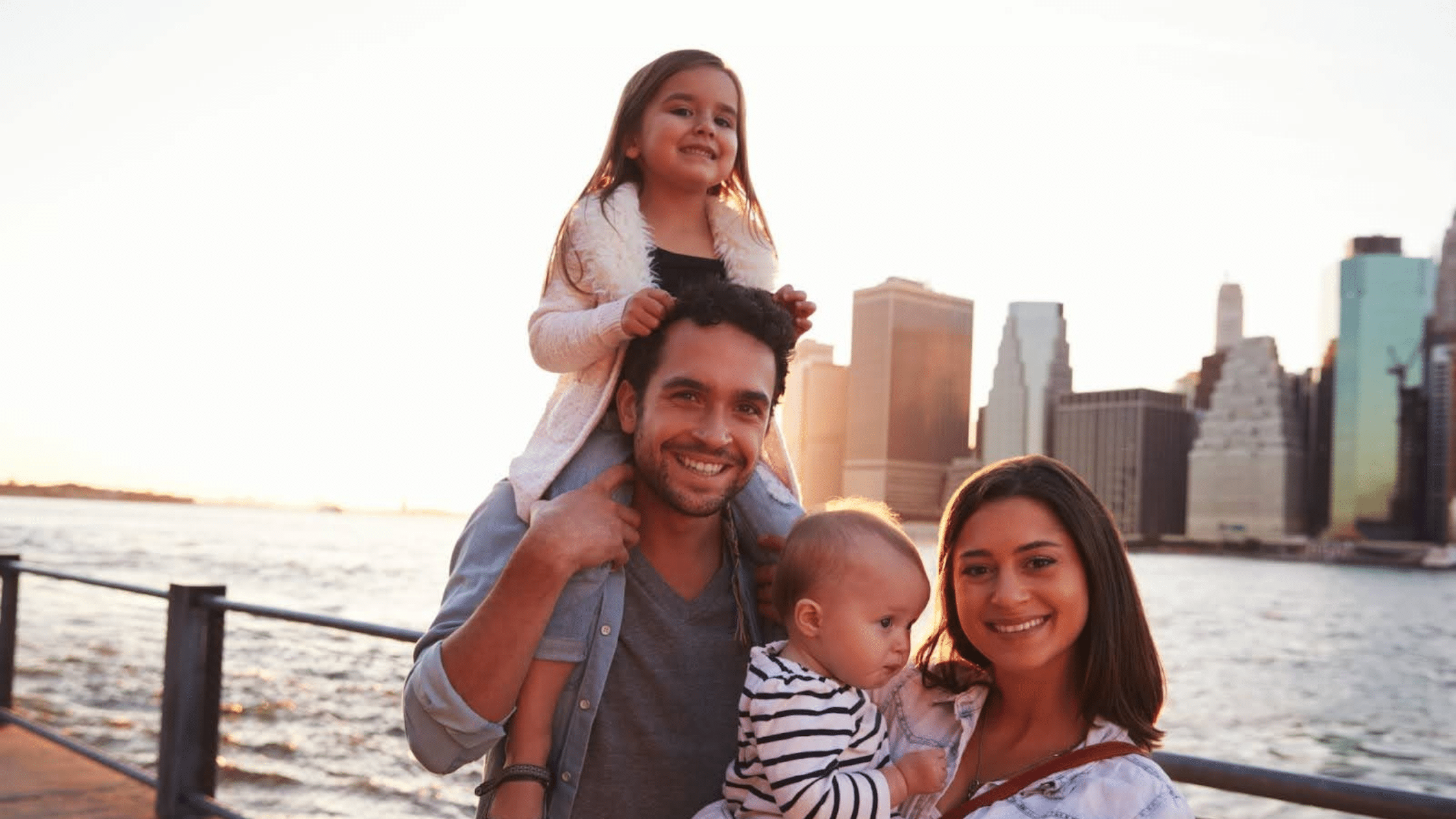 Happy family and New York skyline