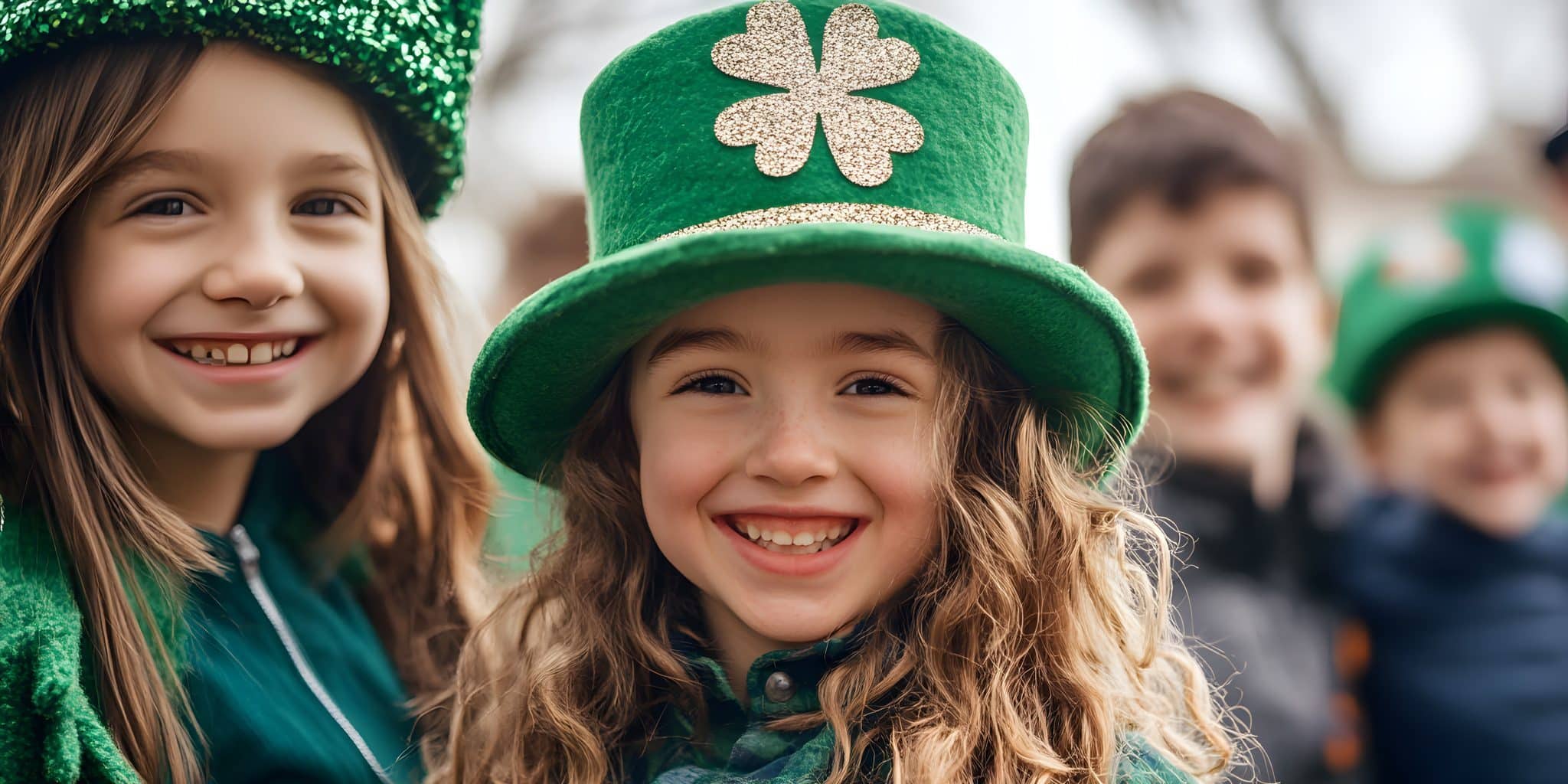 Smiling children celebrating St. Patricks Day