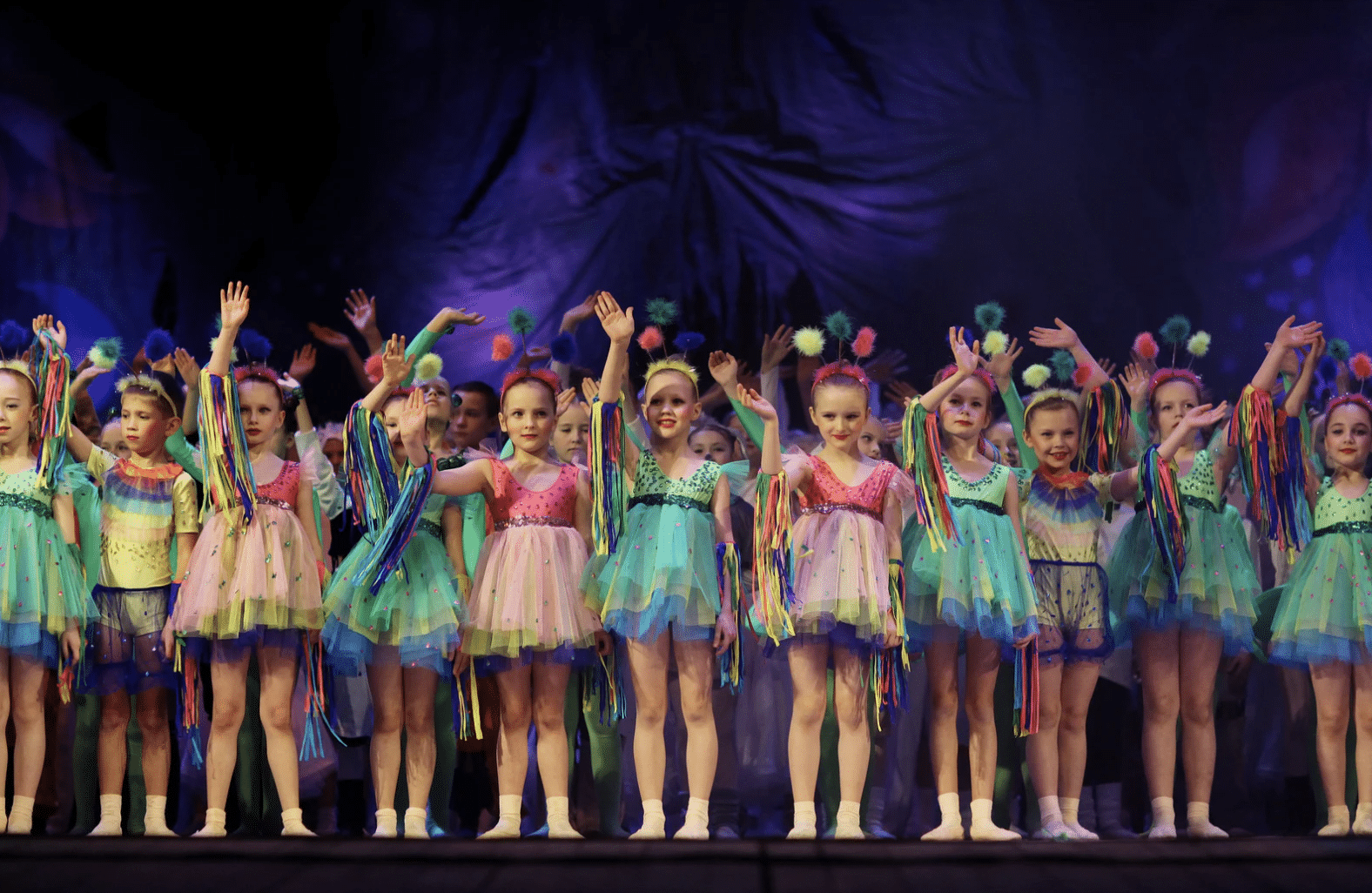 Young performers taking a curtain call Young performers taking a curtain call