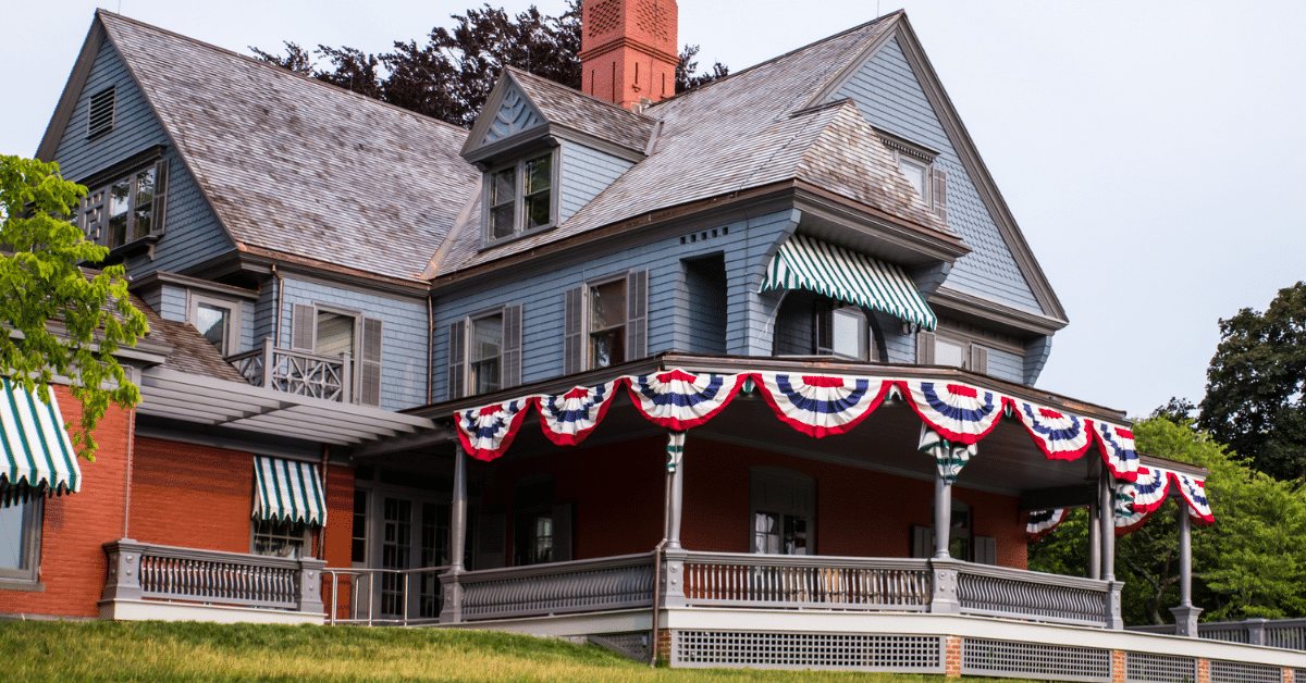 Sagamore Hill – Teddy Roosevelt’s Summer Home in Oyster Bay Teddy Roosevelt’s summer home at Sagamore Hill in Oyster Bay, New York, decorated with patriotic bunting