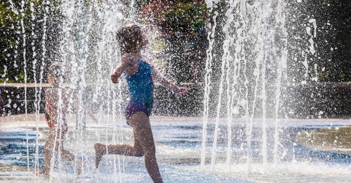 Boston Splash Pad Children playing in a splash pad near Boston on a summer day