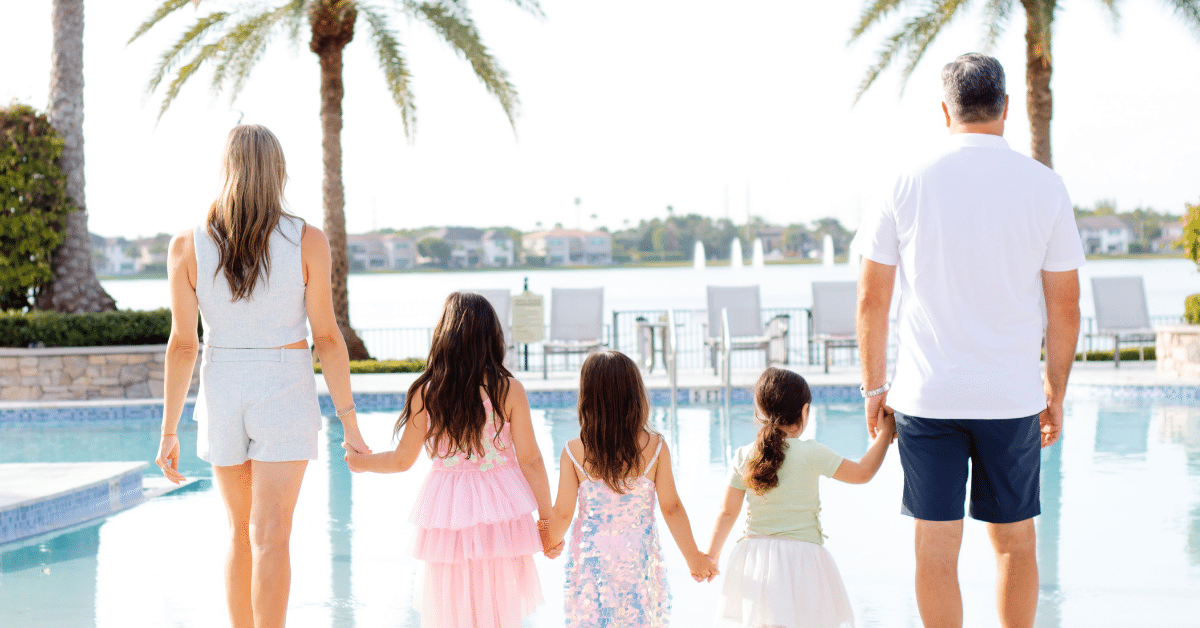 Family Living in Parkland, Florida Family of five with three daughters by a pool in Parkland, Florida